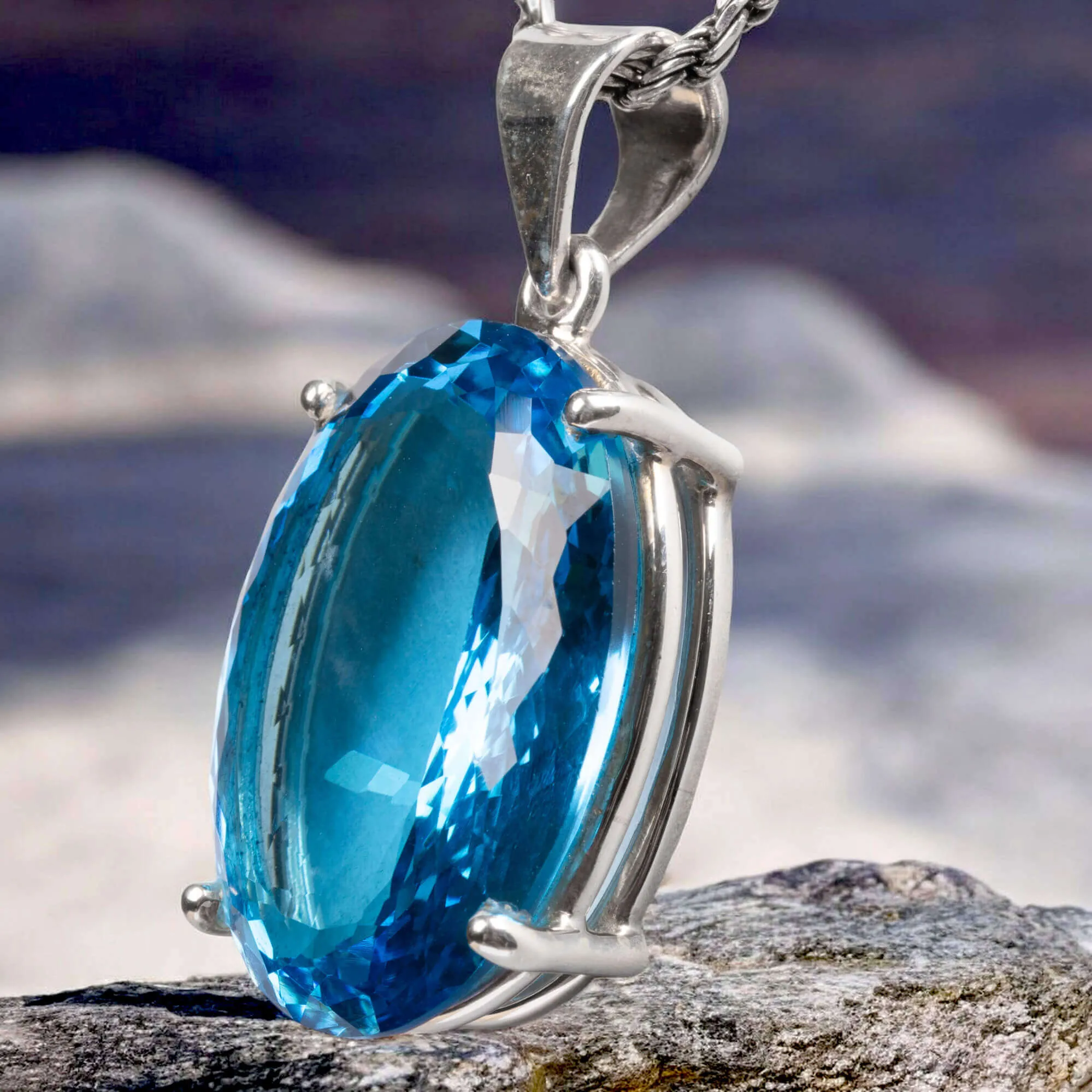 Pendant with Faceted Oval Swiss Blue Topaz.
